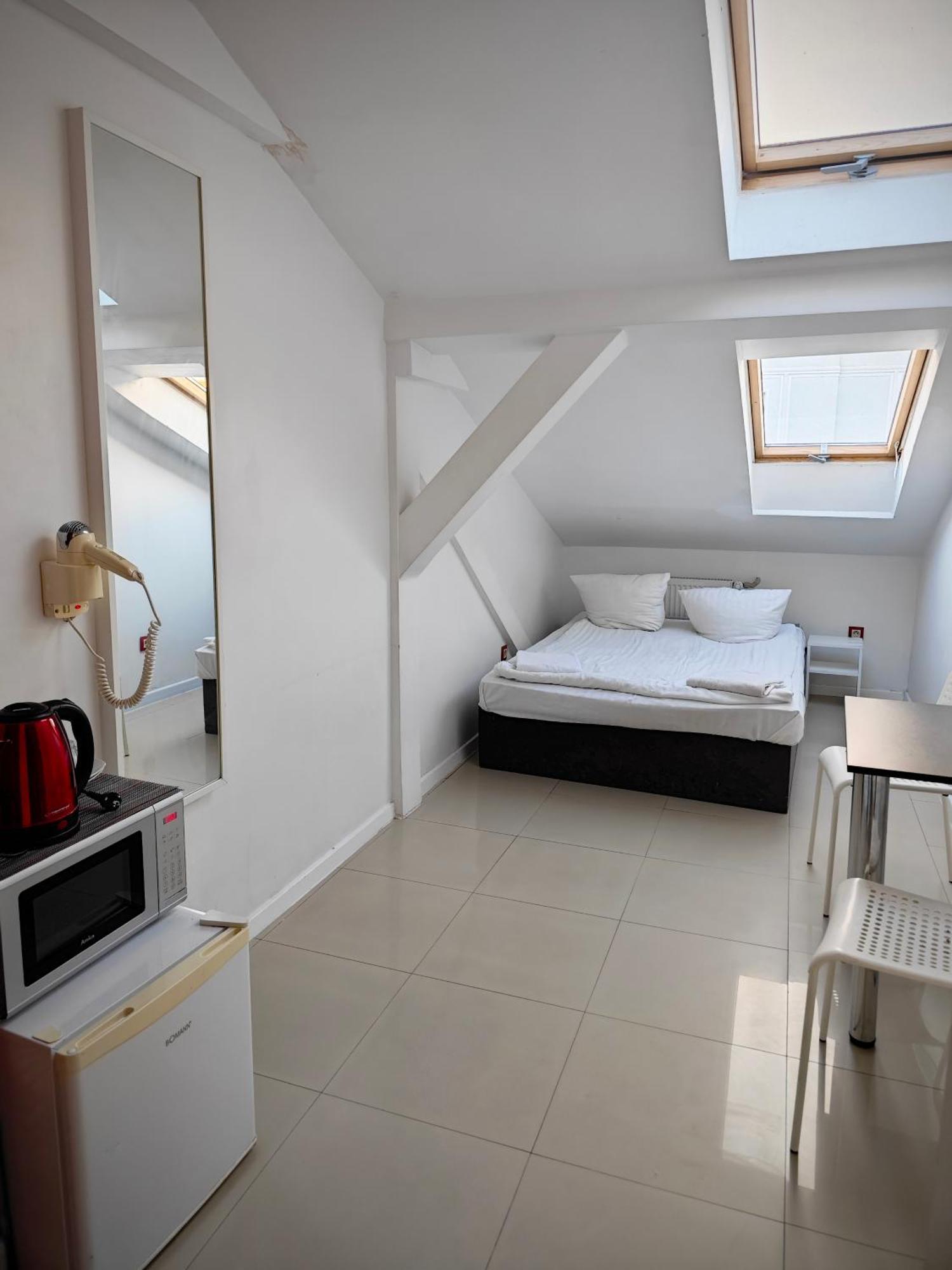 Apartamenty Hoza Attic Studio Βαρσοβία Δωμάτιο φωτογραφία
