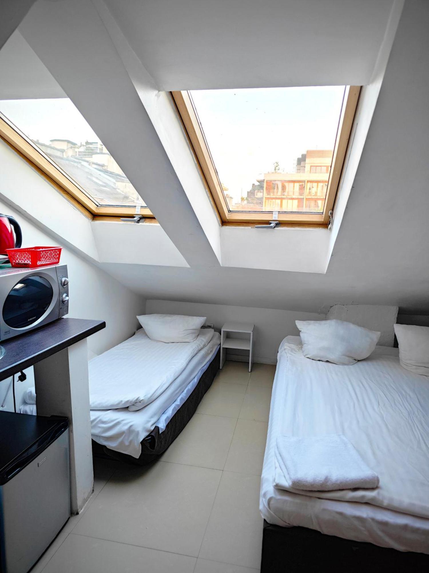 Apartamenty Hoza Attic Studio Βαρσοβία Δωμάτιο φωτογραφία