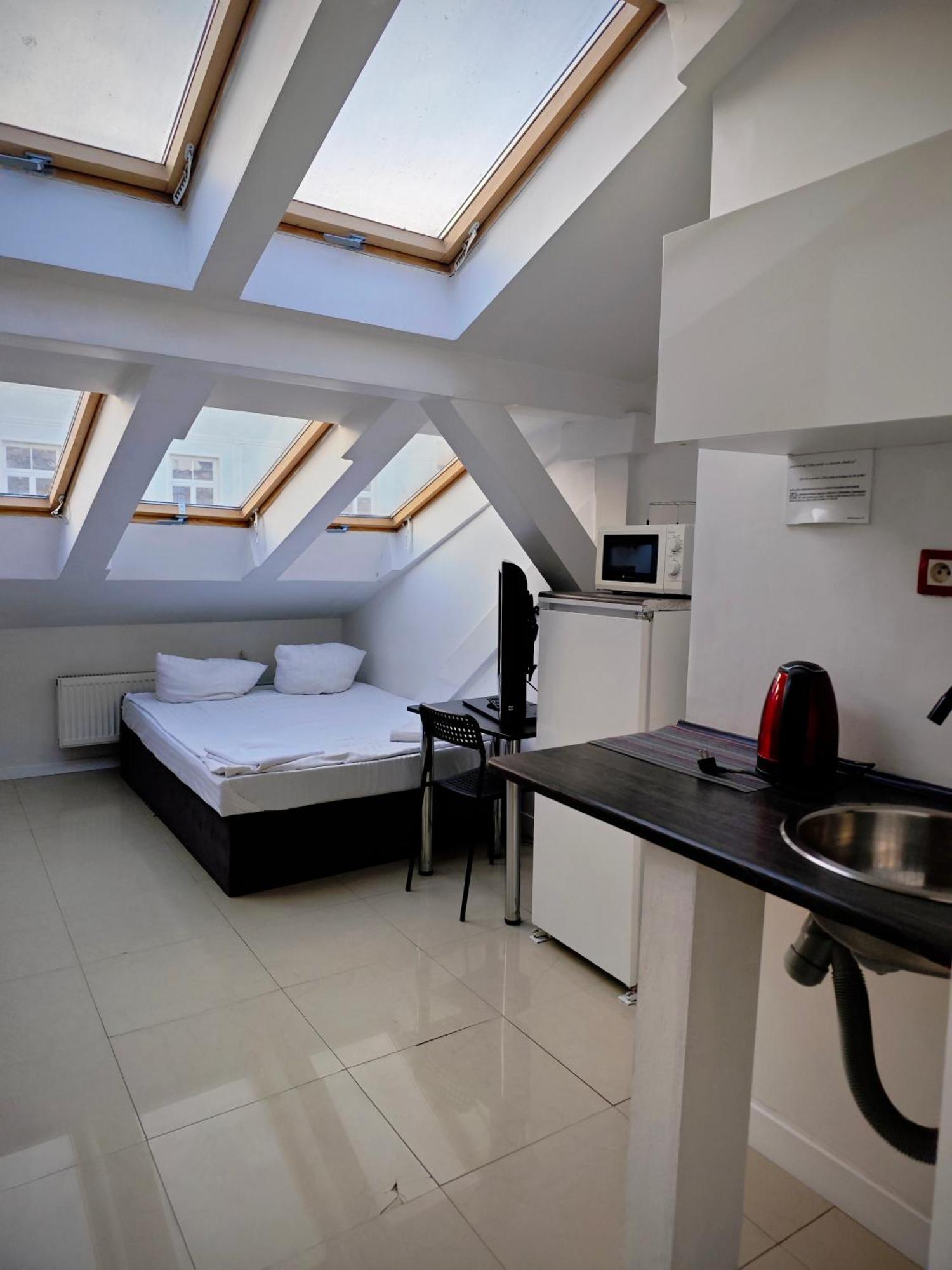 Apartamenty Hoza Attic Studio Βαρσοβία Δωμάτιο φωτογραφία