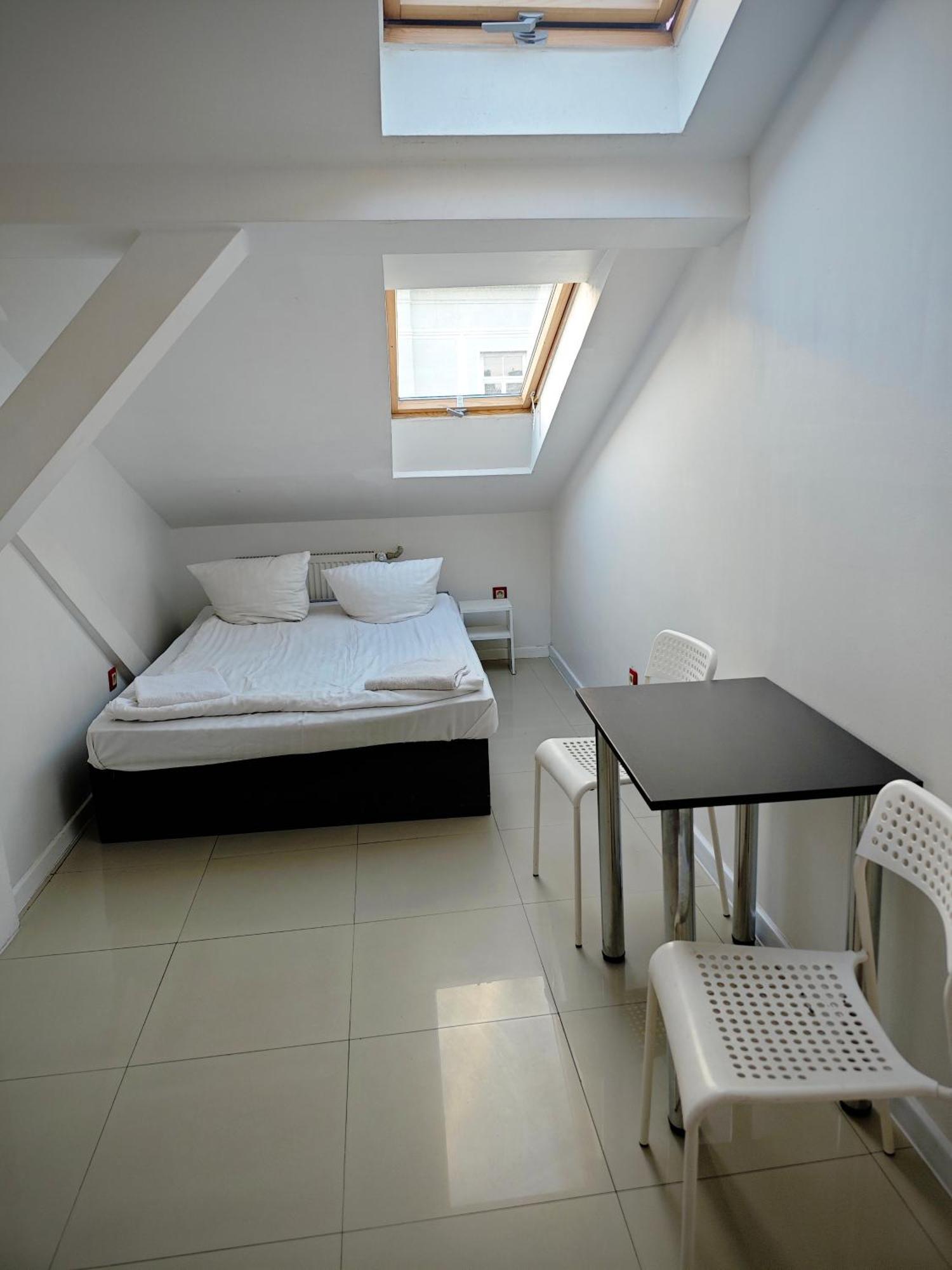 Apartamenty Hoza Attic Studio Βαρσοβία Δωμάτιο φωτογραφία